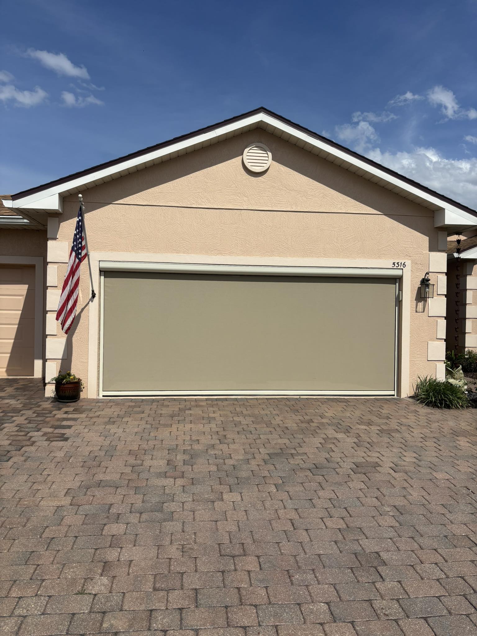 Motorized garage screen installation